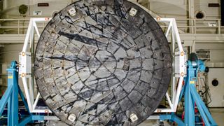 After NASA’s Orion spacecraft was recovered at the conclusion of the Artemis 1 test flight and transported to NASA’s Kennedy Space Center in Florida, its heat shield was removed from the crew module inside the Operations and Checkout Building and rotated for inspection.