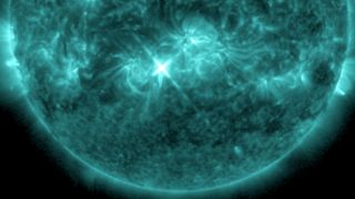 A solar flare shines as a bright light on the sun on Christmas Day, 2024.